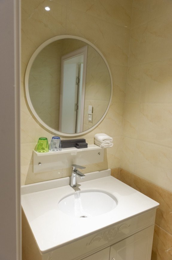 光雾和谷酒店电话是多少？