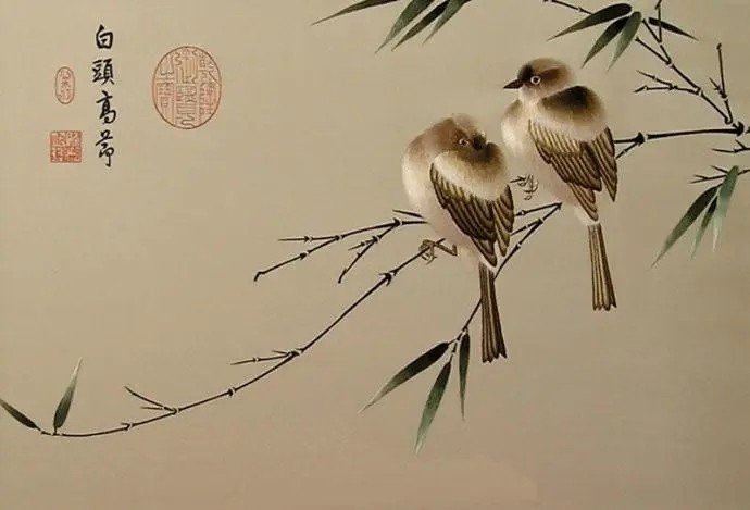 湘绣的双面全异绣采用什么针法被外国友人称为魔术般的艺术