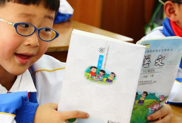 拘的拼音和部首