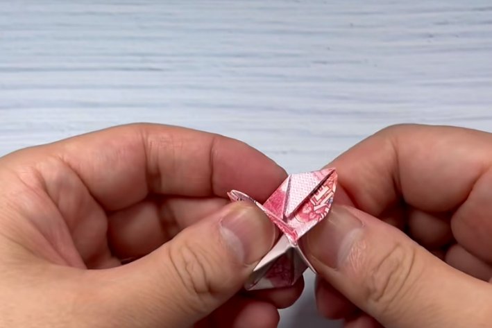 人民币怎么叠玫瑰花