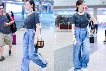 张靓颖被曝获接机   机场素颜照被吐槽太素人